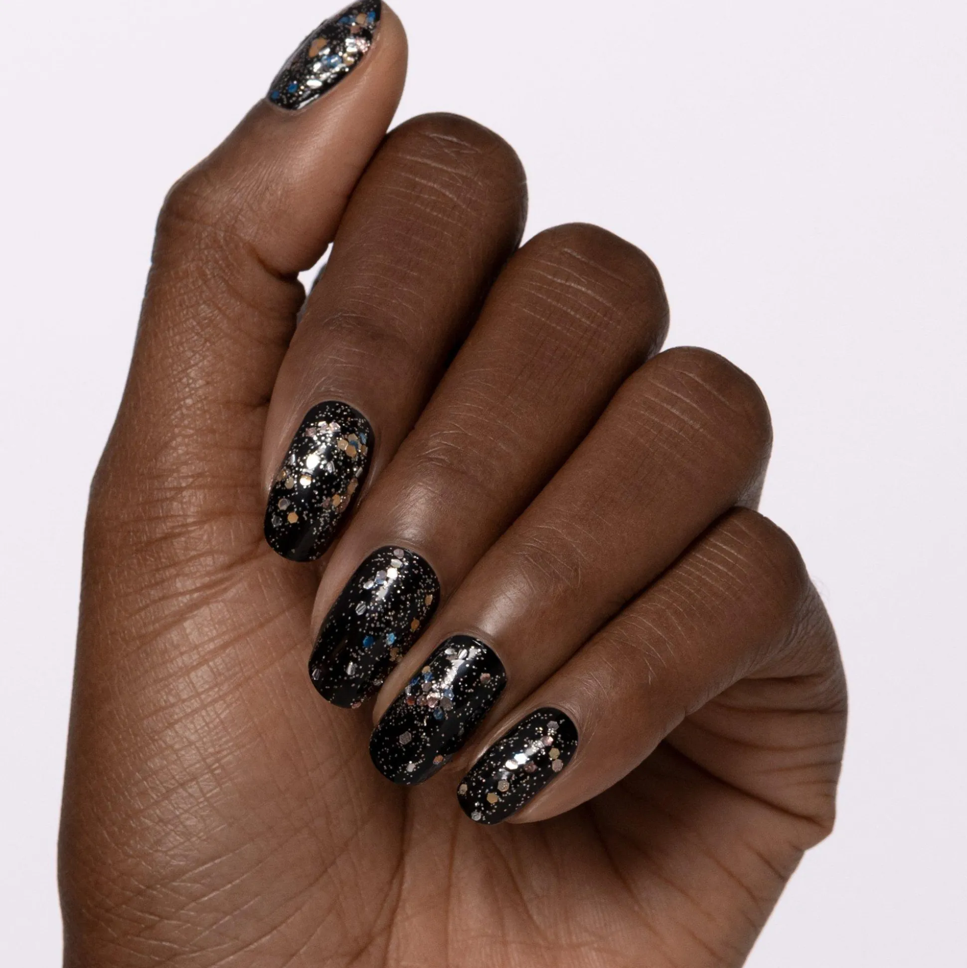 essence Über- Und Unterlack>confetti PARTY transforming top coat
