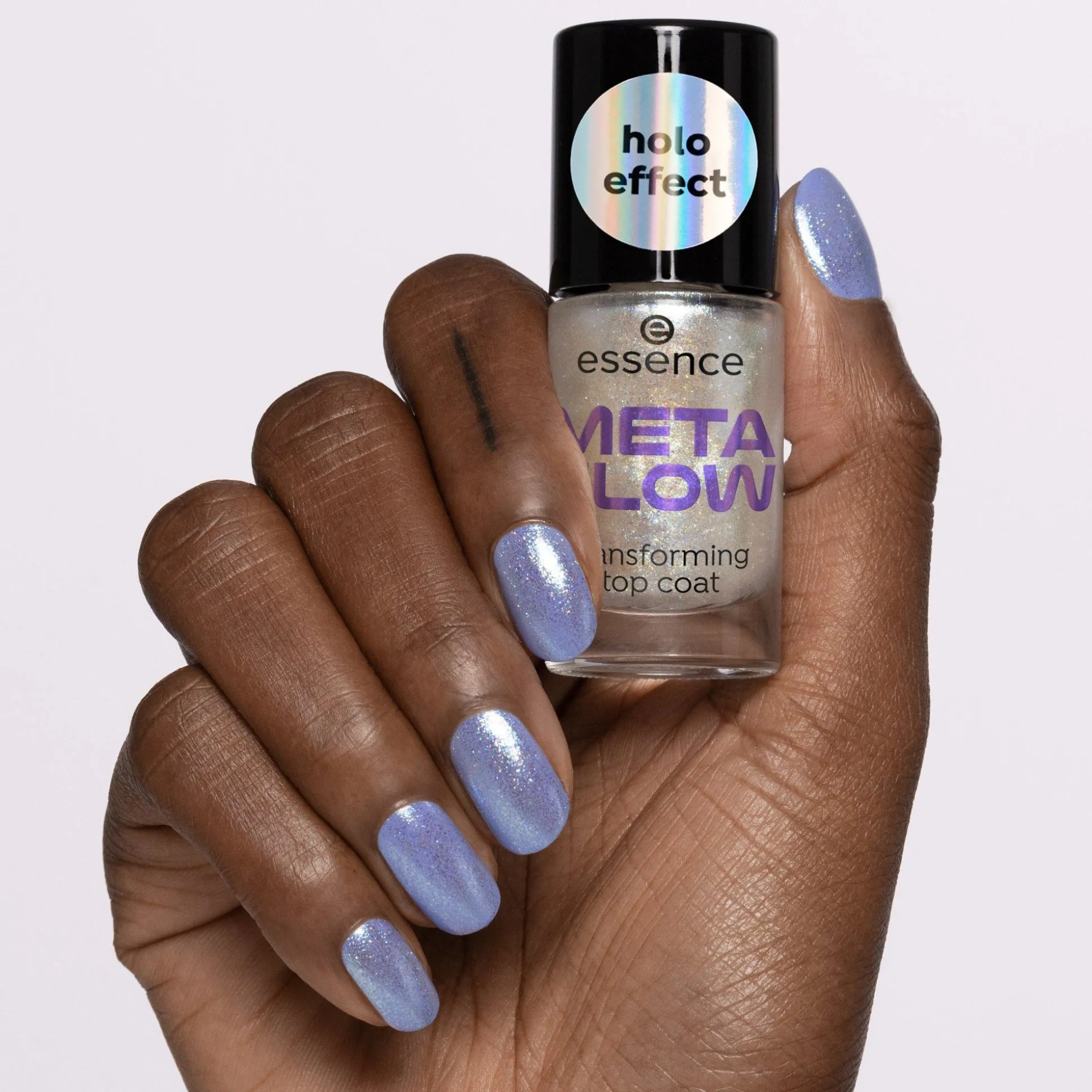 essence Über- Und Unterlack>META GLOW transforming top coat